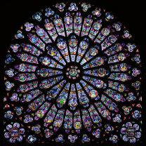 The north transept rose stained glass window at Notre Dame de Paris