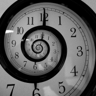 Recursive clocks in a snail-shell pattern. Photo Time Travel Haikus 5-7-5 by CityGypsy11